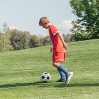 Boy Playing Soccer